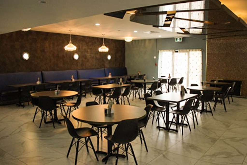 奥里利亚 哈威曼旅馆及会议中心酒店 餐厅 照片